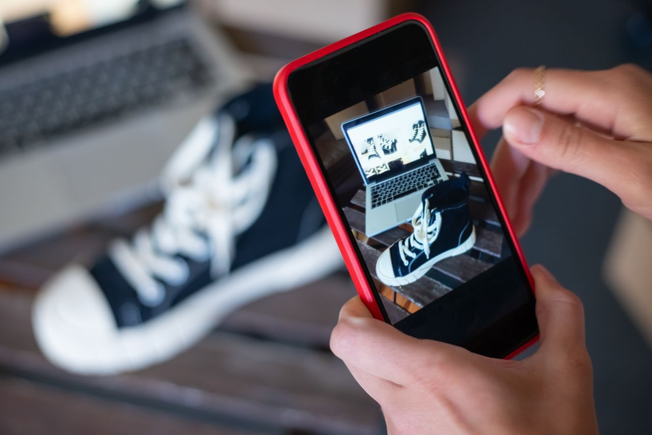 mobile-02 Capturing sneakers with a mobile phone for an online store showcase. E-commerce at its best.